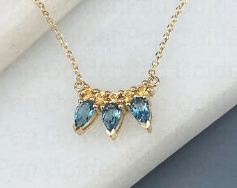 18K Solid Gold  pendant with yellow sapphires and blue topaz