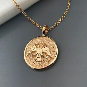 14k solid gold pendant with eagle, diameter 1.8cm