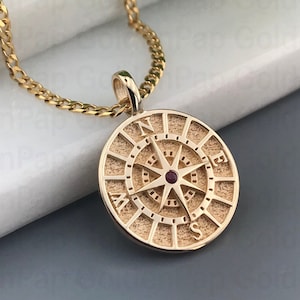 14k solid gold pendant with natural ruby, gold compass