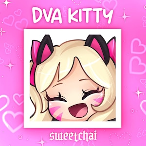 May include: A digital illustration of a smiling anime-style character with blonde hair, black cat ears, and pink accents. The text "DVA KITTY" is at the top, and "sweetchai" is at the bottom, all on a pink background with hearts.