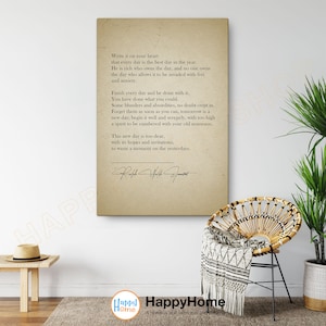 May include: A beige canvas print with a quote about making the most of each day. The quote is attributed to Ralph Waldo Emerson. The print is framed with a black border.