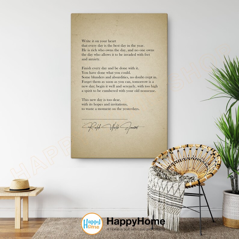 May include: A beige canvas print with a quote about making the most of each day. The quote is attributed to Ralph Waldo Emerson. The print is framed with a black border.