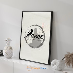 May include: Framed art print with a black frame. The artwork features the word "Peace" in a handwritten style, with the phrase "begin within yourself" below. A silhouette of a person in meditation is inside a gray circle.