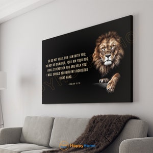 May include: A black canvas print with a lion's head and a gold quote from Isaiah 41:10. The quote reads: "So do not fear, for I am with you; do not be dismayed, for I am your God. I will strengthen you and help you; I will uphold you with my righteous right hand."