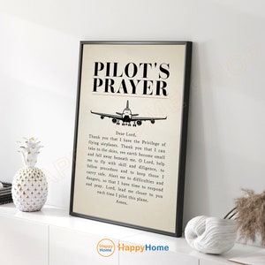 May include: Black and white printable wall art with a vintage aesthetic. The print features a silhouette of an airplane and the text "Pilot's Prayer". The text includes a prayer for safe travels and guidance while flying.