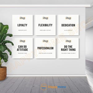 May include: Six white square wall art pieces with motivational phrases in black text. Phrases include "Loyalty," "Flexibility," "Dedication," "Can Do Attitude," "Professionalism," and "Do the Right Thing."