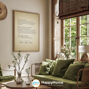 May include: A framed print with a vintage aesthetic featuring a poem about making the most of each day. The poem is written in a cursive font and signed at the bottom. The print is displayed on a wall in a living room setting.