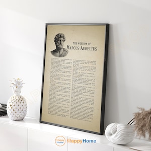 May include: A black framed print with a white background featuring a bust of Marcus Aurelius and a quote from his writings. The quote reads "The Wisdom of Marcus Aurelius".