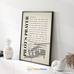 May include: A black framed print with a beige background and black text. The text is a pilot's prayer. The print features a silhouette of a helicopter.