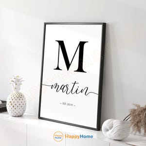 Puede incluir: Arte de pared imprimible en blanco y negro con la letra M y la palabra "martin" en una fuente de escritura. El texto "EST. 2019" está debajo del nombre.