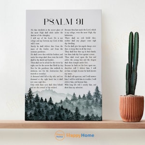 May include: A framed canvas print featuring the text of Psalm 91, set against a backdrop of a misty forest scene. The artwork includes a potted cactus in a terracotta pot. The text is in a classic serif font.
