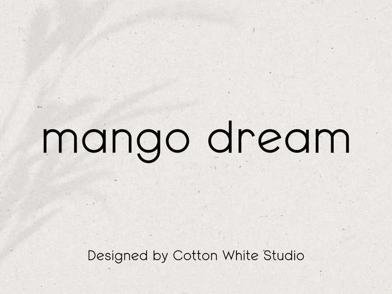K&ouml;nnte beinhalten: Schwarz-wei&szlig;es Textlogo auf wei&szlig;em Hintergrund. Das Logo lautet "mango dream" und wurde von Cotton White Studio entworfen.