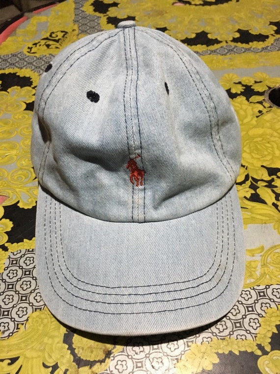 yellow polo hat with leather strap