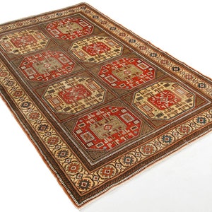 Vintage Turkish Wool Area Rug: Handmade Geometric Earth Tones