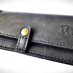 Cartera de cuero negra hecha a mano