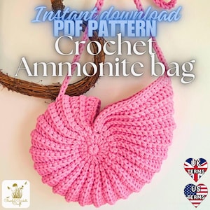 May include: A pink crochet bag in the shape of an ammonite shell. The bag has a strap and is made of thick yarn. Text on the image reads "Instant download PDF pattern Crochet Ammonite bag."