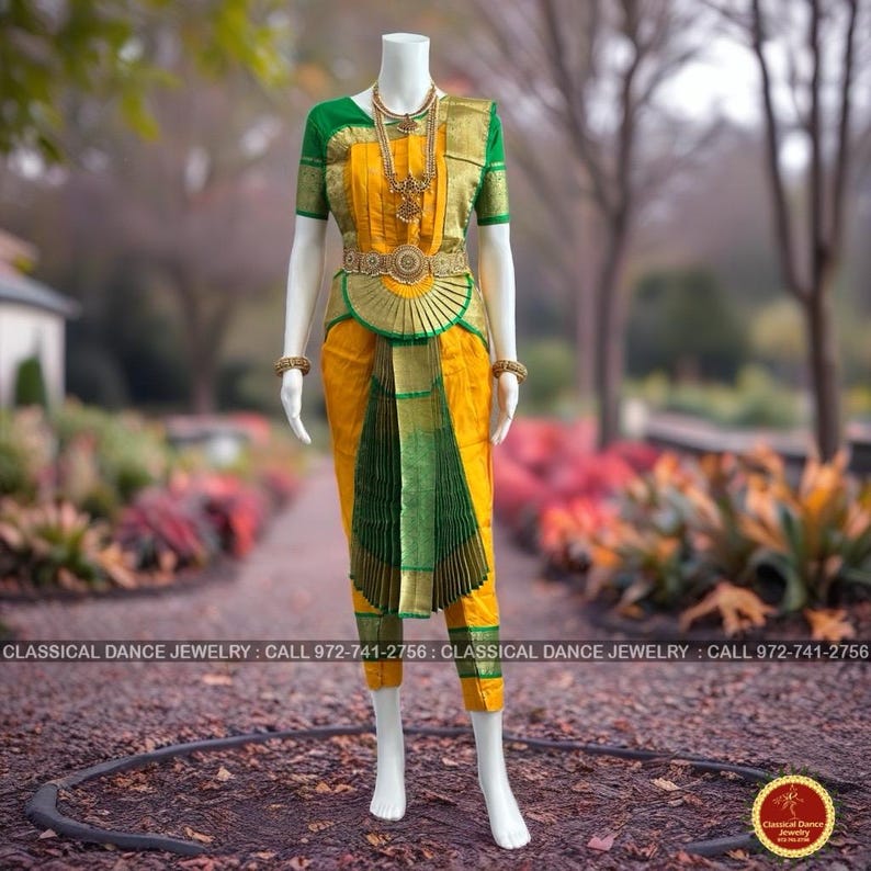 May include: A traditional Indian classical dance costume on a mannequin. The outfit features a yellow top and pants with green and gold accents. A gold necklace and belt complete the ensemble. The text "CLASSICAL DANCE JEWELRY" is visible at the bottom.