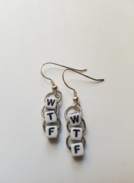 Word dangle sale earrings