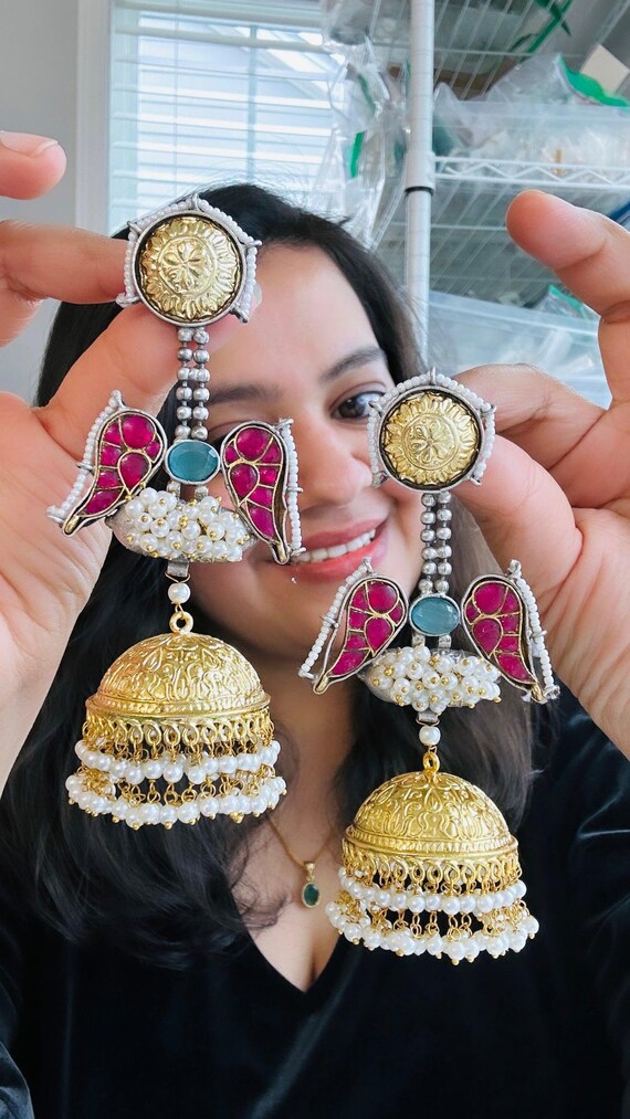 Anaya German Silver Golden antique pearl Ruby Jumbo jhumkas earrings desi jhumkas jhumkas Indian jewelry bollywood jhumkas
