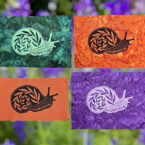 May include: Four rectangular fabric swatches featuring a snail graphic with a leaf-patterned shell. The top left is teal with a light green snail, top right is orange with a black snail, bottom left is orange with a black snail, and bottom right is purple with a light purple snail.