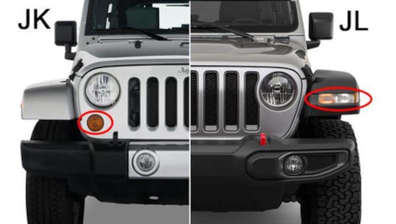 May include: A side-by-side comparison of the front ends of a Jeep Wrangler JK and a Jeep Wrangler JL. The JK has a rounder, more traditional design, while the JL has a more angular, modern design. Both vehicles are silver and have black bumpers.