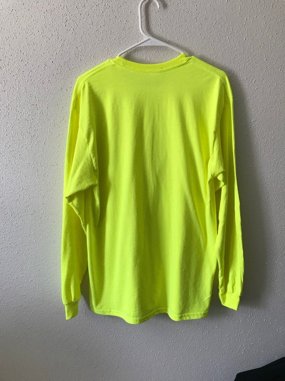 neon yellow long sleeve shirt