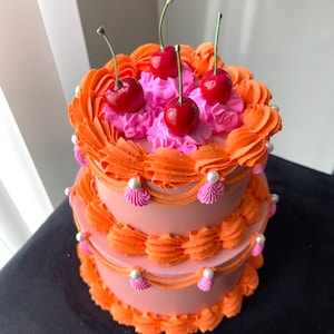 Orange and Pink Cherry Two Tier Cake