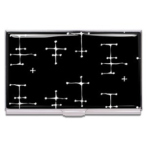 May include: A black and white business card holder with a geometric pattern. The holder is made of metal and has a silver finish.