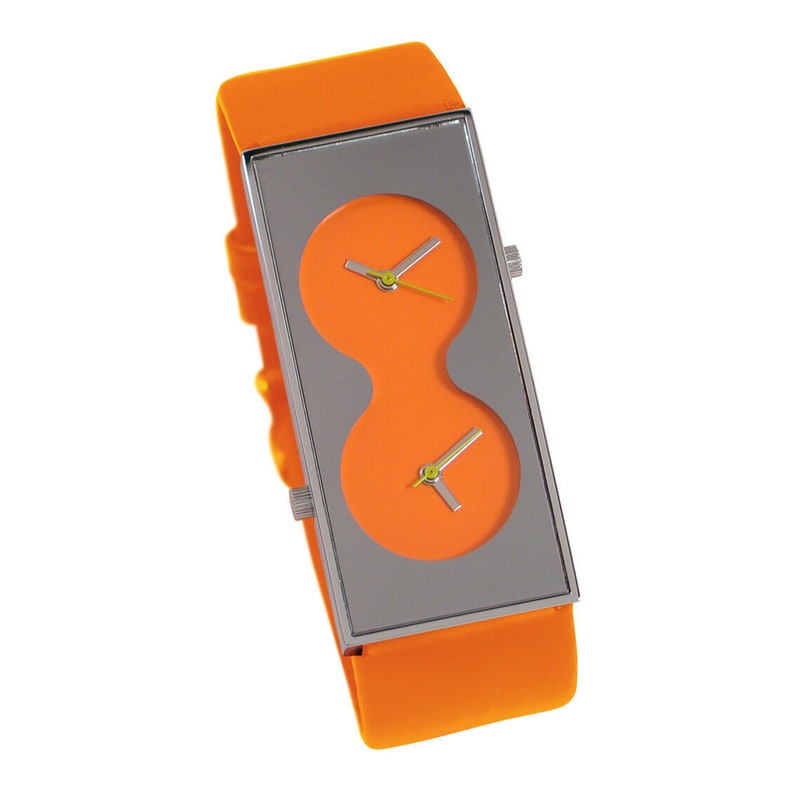 May include: A silver watch with an orange silicone band and two round watch faces. The watch has a unique design with the watch faces cut out of the silver case.