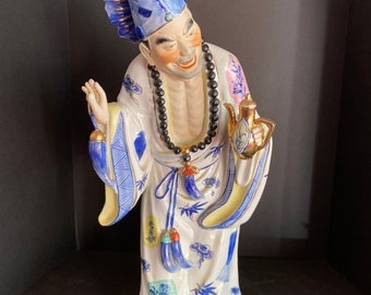 Porcelain Chinese Man in Traditional Robe with Tea Pot
