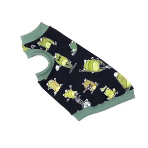 May include: A black dog sweater with a repeating pattern of cartoon frogs in various poses. The sweater has a green ribbed collar and cuffs. The frogs are light green with white bellies and black outlines.