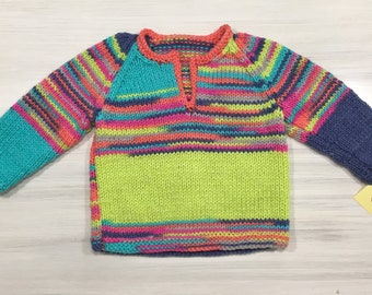 Fun, brightly-colored sweater/jumper. Age 12 months.