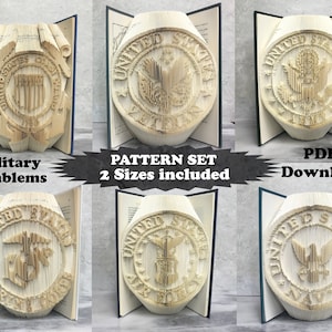 May include: A set of six printable PDF patterns for folding book art of military emblems. The patterns include the United States Army, Navy, Air Force, Marines, Coast Guard, and Space Force. The text "PATTERN SET 2 Sizes included" and "PDF Download" is visible in the image.