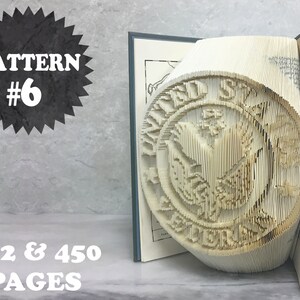 May include: A book with 302 or 450 pages folded into a 3D sculpture of the Great Seal of the United States. The sculpture is made from the pages of a book and is a popular craft project.