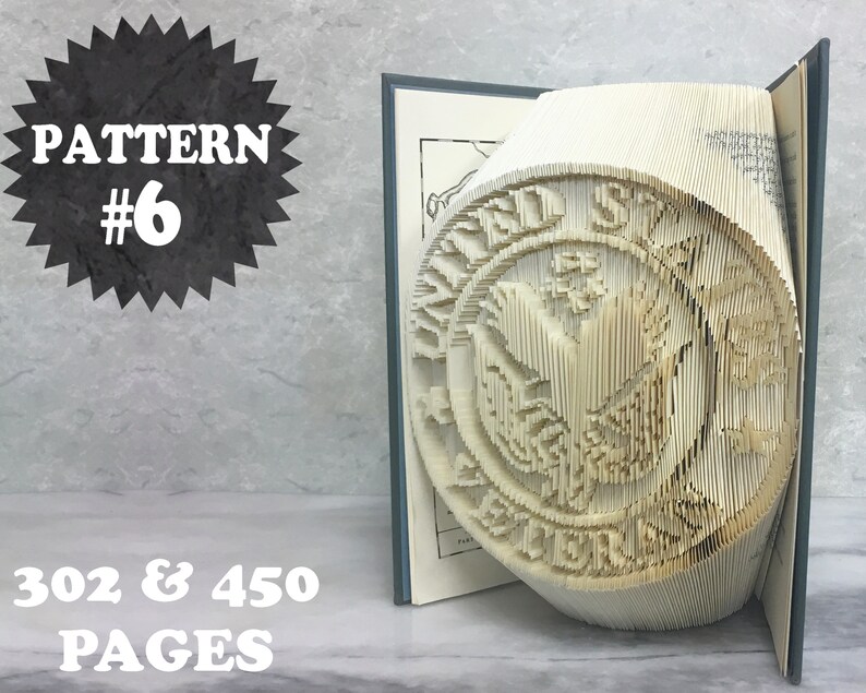 May include: A book with 302 or 450 pages folded into a 3D sculpture of the Great Seal of the United States. The sculpture is made from the pages of a book and is a popular craft project.