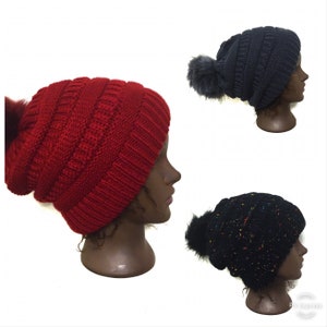 SATIN lined beanie/winter hat with detachable Pom poms.