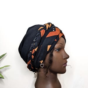 SATIN lined pre tied braided turban.