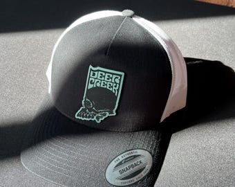 Deer Creek Black Front/ White back Snap Back Trucker Hat