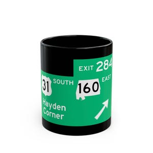 May include: A set of three ceramic mugs with a speckled, matte finish. The mugs are in shades of cream, light gray, and dark gray. Each mug has a simple, minimalist design, perfect for coffee or tea.