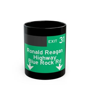 Ronald Reagan Highway Blue Rock Rd road sign Black Mug | Exit 31 highway coffee mug imagem 1