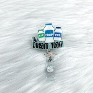 The Dream Team-badgereel, CRNA, anesthesie, medische humor, verwisselbare badgehaspel, intrekbare badgehaspel,