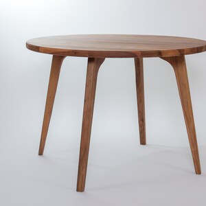 Mid century round dining 2024 table and chairs