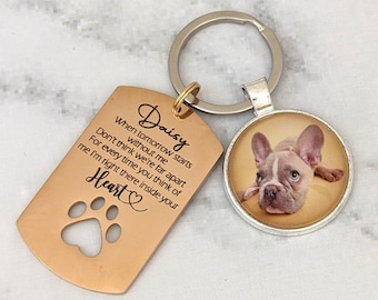 May include: Gold-tone keychain with a photo charm featuring a French bulldog. The charm is attached to a tag with the text "Daisy" and a poem about remembering a pet.
