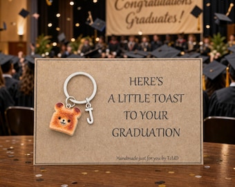 A personalised graduation card. Novelty little toast keyring for celebrations. Congratulations gift.