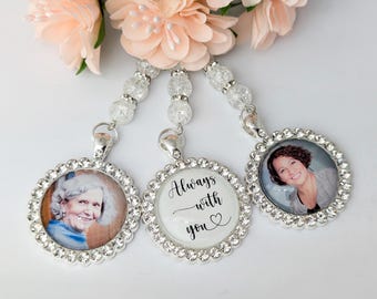 May include: Three silver charm necklaces with rhinestones. One charm features a photo of a woman, another charm features a photo of a woman, and the third charm has the text "Always with you" and a heart.