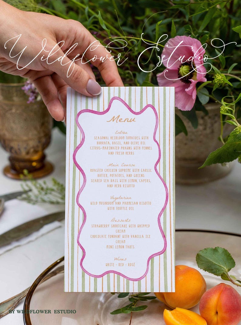 May include: A menu card with a pink and green striped background and a pink wavy border. The menu lists entrees, main courses, vegetarian options, desserts, and wines. The Wildflower Estudio logo is at the top and bottom.