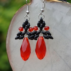 Black with red beaded earrings with crystal