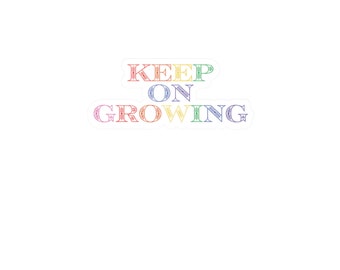 Sticker en vinyle « Continuer à grandir »