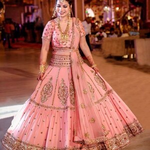 Pinkish Peach Designer Bridal Heavy Embroidered Lehenga Choli