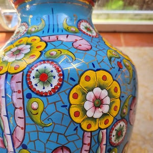 Enameled metal vase
